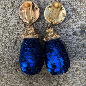 Fun, festive clip on earrings. Gold & bright blue